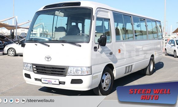 Acheter Import Voiture Toyota Coaster Blanc à Import - Dubai, Marquesas Acheter Import Voiture Toyota Coaster Blanc à Import - Dubai, Marquesas