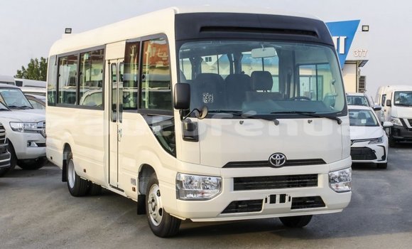 Acheter Import Voiture Toyota Coaster Blanc à Import - Dubai, Marquesas Acheter Import Voiture Toyota Coaster Blanc à Import - Dubai, Marquesas