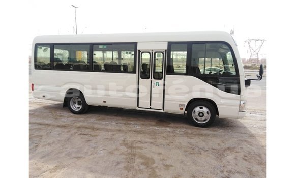 Acheter Import Voiture Toyota Coaster Blanc à Import - Dubai, Marquesas Acheter Import Voiture Toyota Coaster Blanc à Import - Dubai, Marquesas