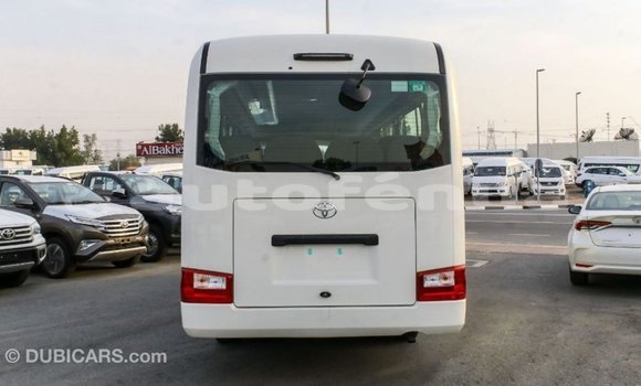 Acheter Import Voiture Toyota Coaster Blanc à Import - Dubai, Marquesas Acheter Import Voiture Toyota Coaster Blanc à Import - Dubai, Marquesas