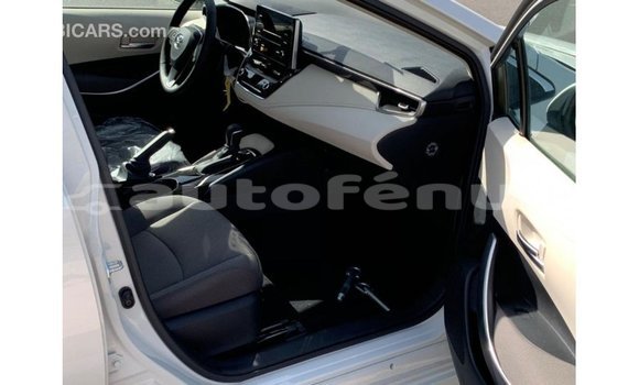 Buy Import Toyota Corolla White Car in Import - Dubai in Marquesas Buy Import Toyota Corolla White Car in Import - Dubai in Marquesas