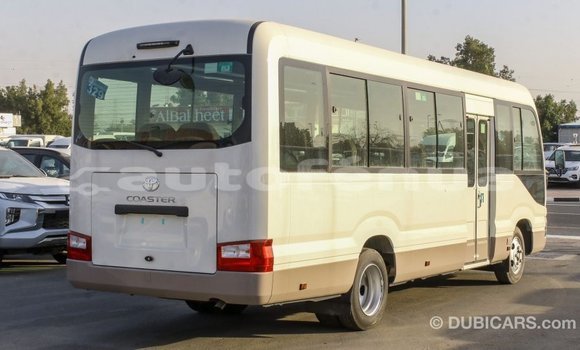 Acheter Import Voiture Toyota Coaster Blanc à Import - Dubai, Marquesas Acheter Import Voiture Toyota Coaster Blanc à Import - Dubai, Marquesas