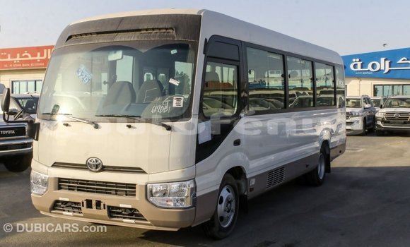 Acheter Import Voiture Toyota Coaster Blanc à Import - Dubai, Marquesas Acheter Import Voiture Toyota Coaster Blanc à Import - Dubai, Marquesas