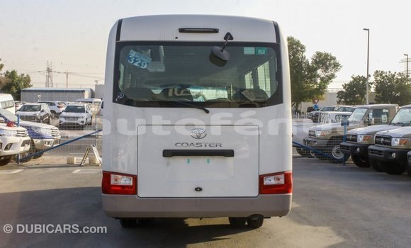 Acheter Import Voiture Toyota Coaster Blanc à Import - Dubai, Marquesas Acheter Import Voiture Toyota Coaster Blanc à Import - Dubai, Marquesas