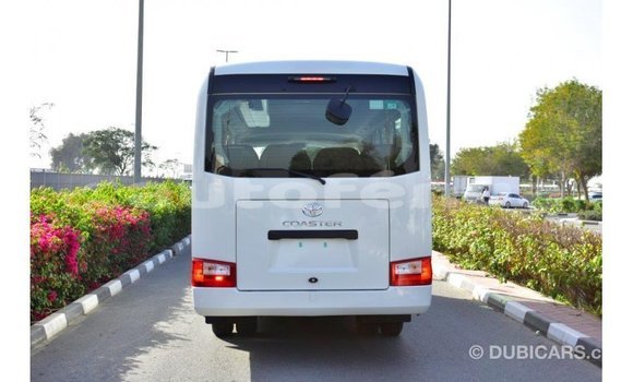 Acheter Import Voiture Toyota Coaster Blanc à Import - Dubai, Marquesas Acheter Import Voiture Toyota Coaster Blanc à Import - Dubai, Marquesas