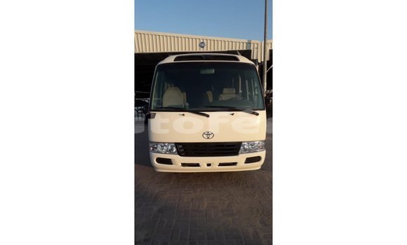 Buy Import Toyota Coaster White Car in Import - Dubai in Marquesas