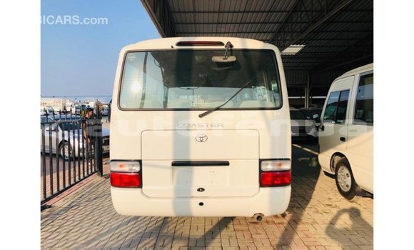 Acheter Import Voiture Toyota Coaster Blanc à Import - Dubai, Marquesas Acheter Import Voiture Toyota Coaster Blanc à Import - Dubai, Marquesas