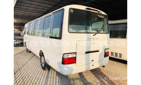 Acheter Import Voiture Toyota Coaster Blanc à Import - Dubai, Marquesas Acheter Import Voiture Toyota Coaster Blanc à Import - Dubai, Marquesas