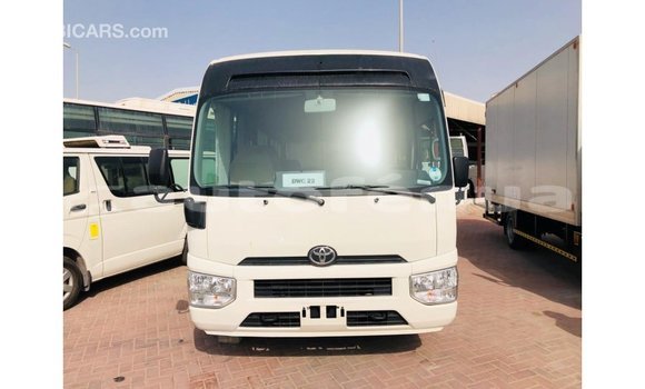 Acheter Import Voiture Toyota Coaster Blanc à Import - Dubai, Marquesas Acheter Import Voiture Toyota Coaster Blanc à Import - Dubai, Marquesas