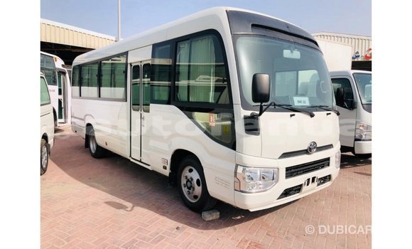 Acheter Import Voiture Toyota Coaster Blanc à Import - Dubai, Marquesas Acheter Import Voiture Toyota Coaster Blanc à Import - Dubai, Marquesas