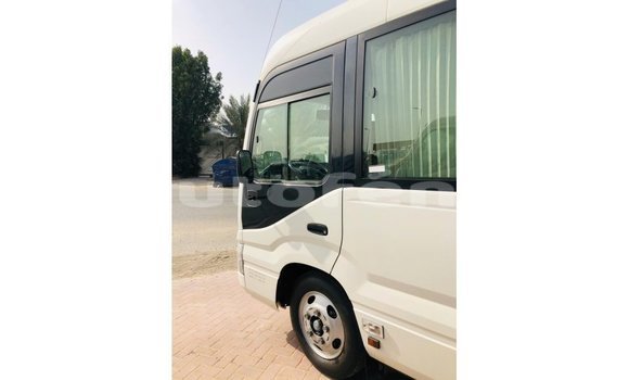 Acheter Import Voiture Toyota Coaster Blanc à Import - Dubai, Marquesas Acheter Import Voiture Toyota Coaster Blanc à Import - Dubai, Marquesas