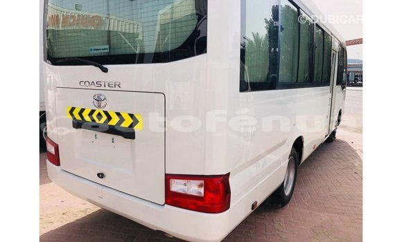Acheter Import Voiture Toyota Coaster Blanc à Import - Dubai, Marquesas Acheter Import Voiture Toyota Coaster Blanc à Import - Dubai, Marquesas