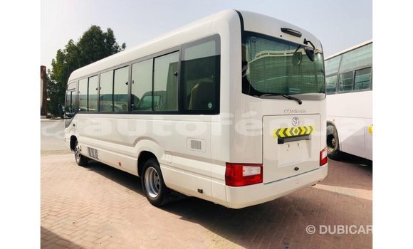 Acheter Import Voiture Toyota Coaster Blanc à Import - Dubai, Marquesas Acheter Import Voiture Toyota Coaster Blanc à Import - Dubai, Marquesas
