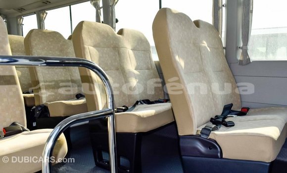 Acheter Import Voiture Toyota Coaster Blanc à Import - Dubai, Marquesas Acheter Import Voiture Toyota Coaster Blanc à Import - Dubai, Marquesas