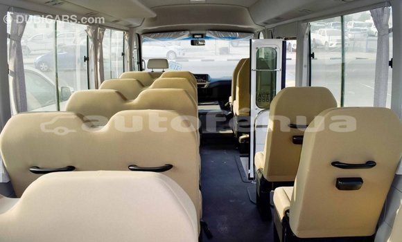 Acheter Import Voiture Toyota Coaster Blanc à Import - Dubai, Marquesas Acheter Import Voiture Toyota Coaster Blanc à Import - Dubai, Marquesas