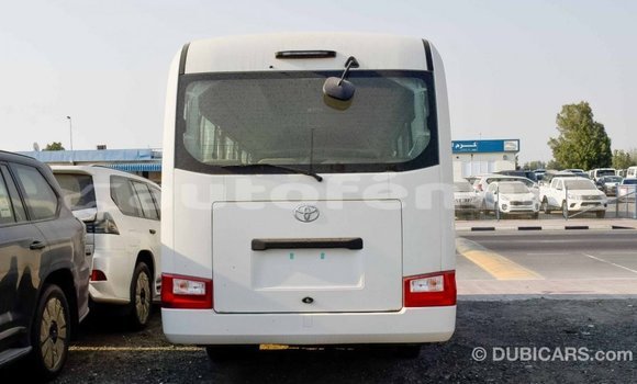 Acheter Import Voiture Toyota Coaster Blanc à Import - Dubai, Marquesas Acheter Import Voiture Toyota Coaster Blanc à Import - Dubai, Marquesas