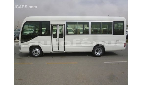 Acheter Import Voiture Toyota Coaster Blanc à Import - Dubai, Marquesas Acheter Import Voiture Toyota Coaster Blanc à Import - Dubai, Marquesas