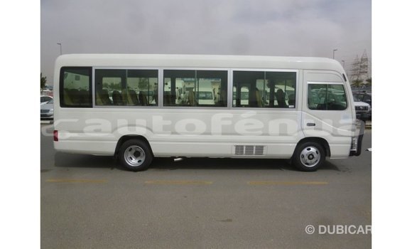 Acheter Import Voiture Toyota Coaster Blanc à Import - Dubai, Marquesas Acheter Import Voiture Toyota Coaster Blanc à Import - Dubai, Marquesas
